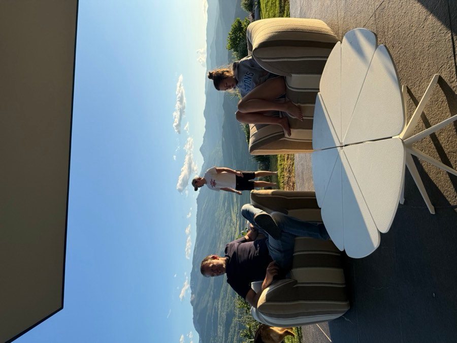 Rooftop terrace with mountain views and outdoor seating