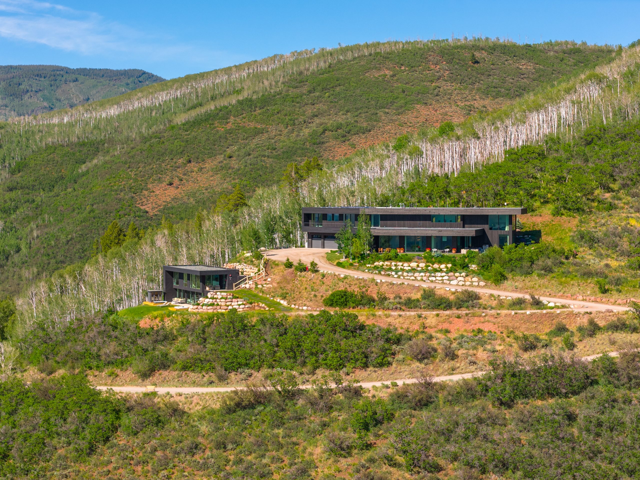 542 Carroll Drive — the main house and guest house.