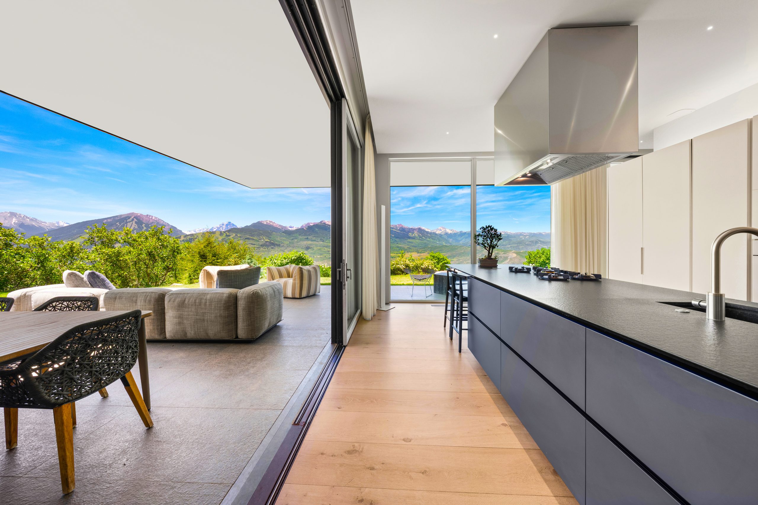 A Boffi kitchen; every pane of glass aimed at the range.