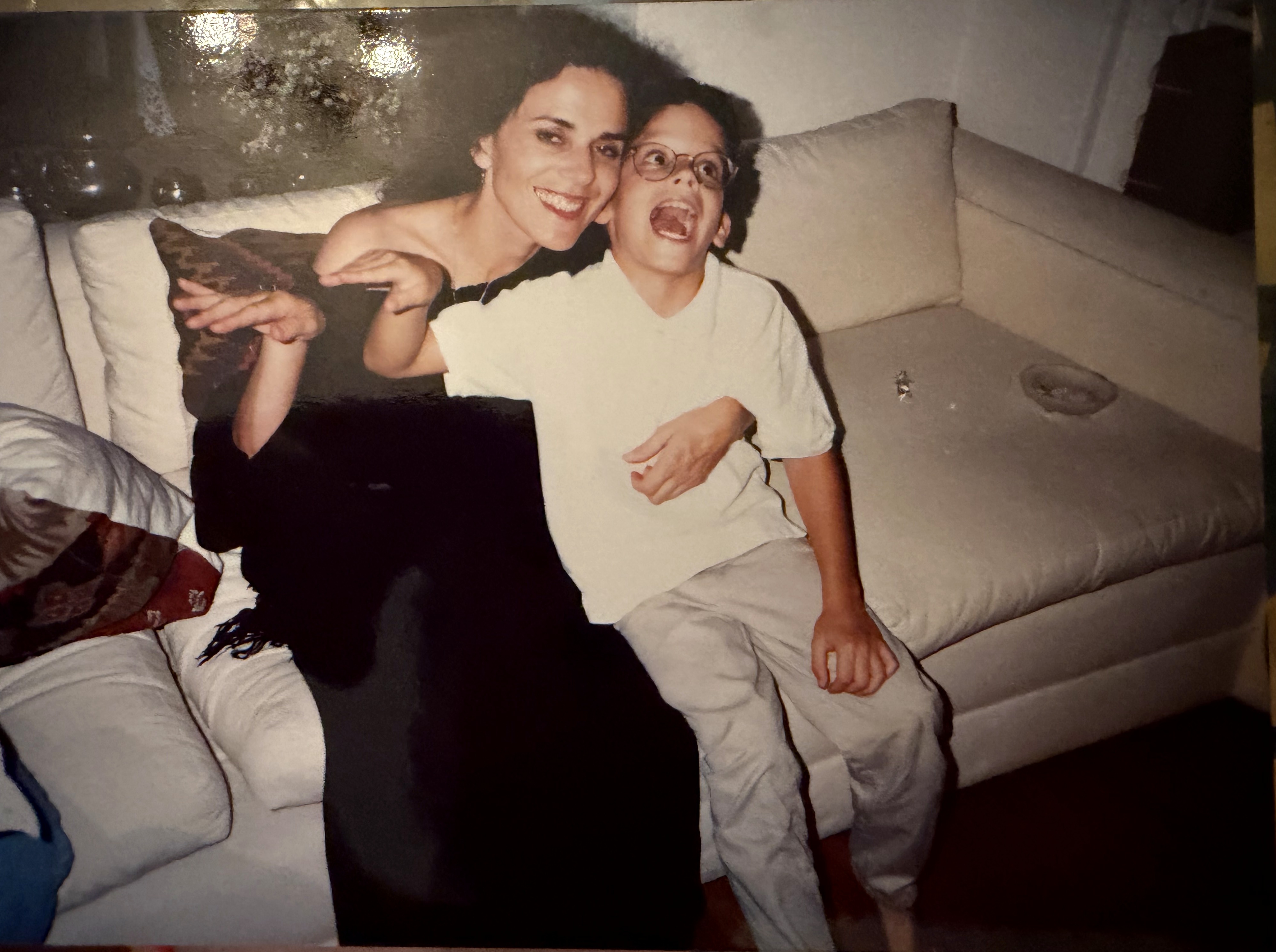 My mother and me in the apartment, sometime in the early 1990s. She still lives in Unit 6.
