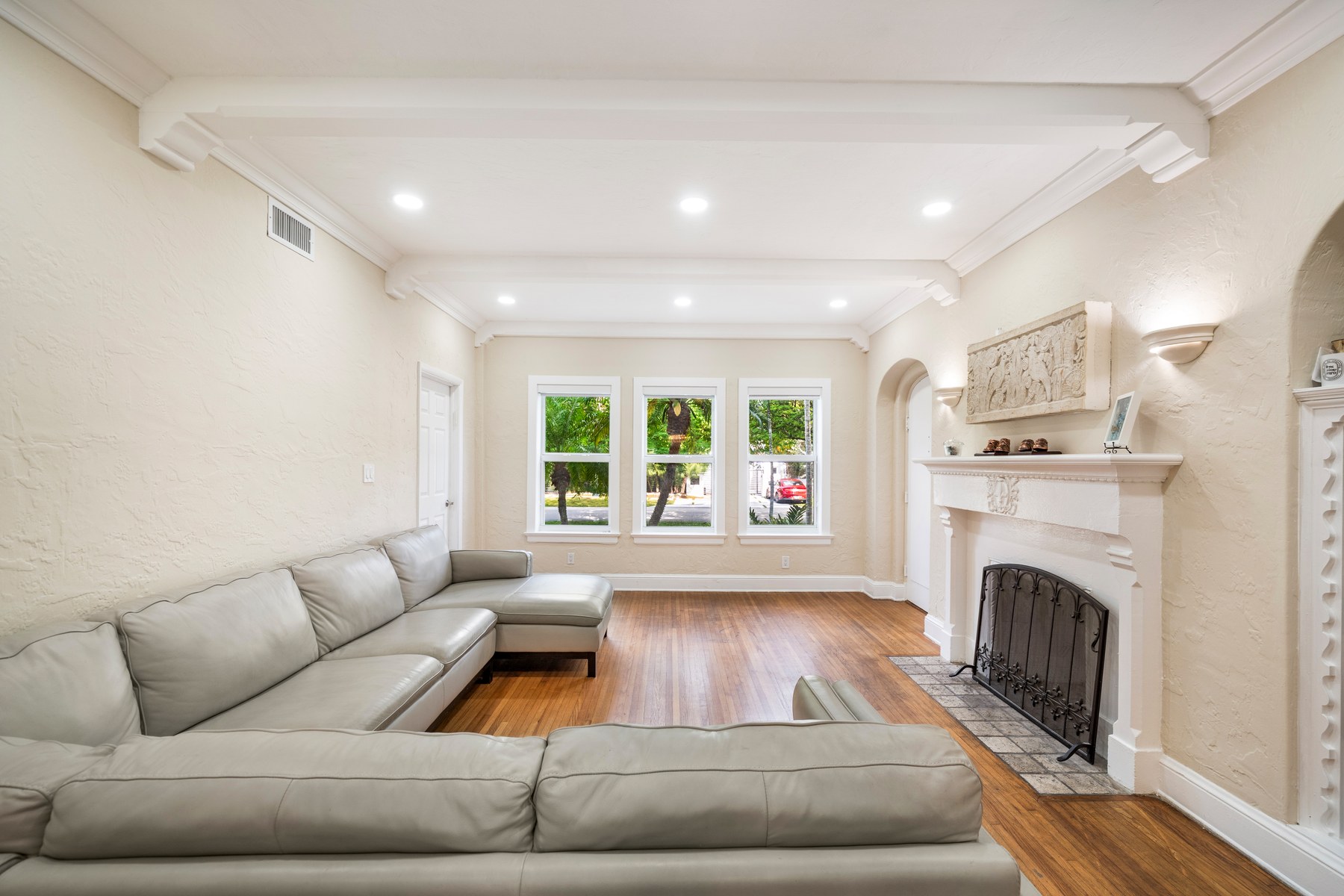 Present day Unit 1 has original detail throughout — hardwood floors, beamed ceilings, plaster moulding, the architectural integrity that is very hard to replicate.
