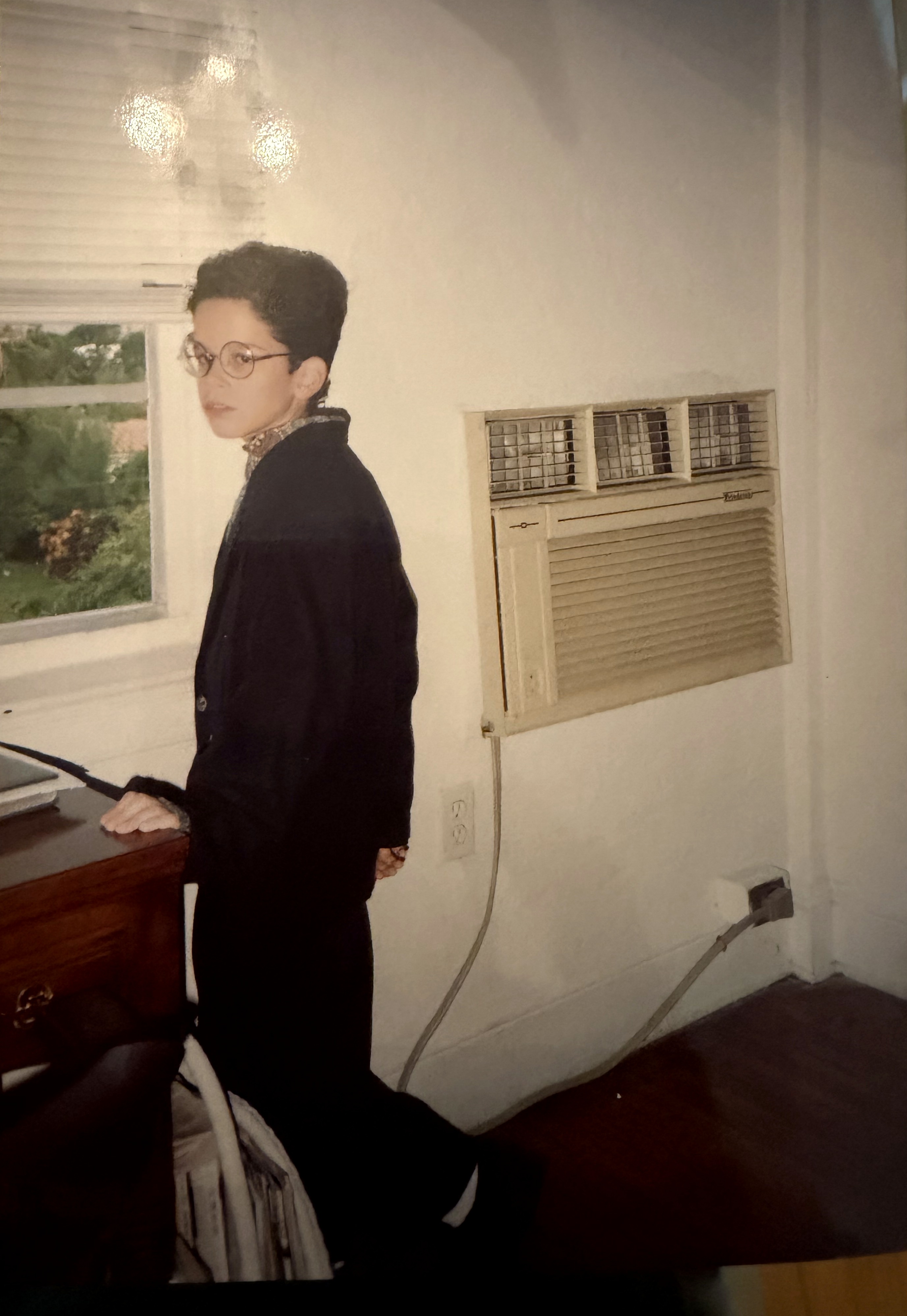Me in Penthouse 6, early 1990s. Wall unit AC. Window facing west in living room. My mother still lives there.