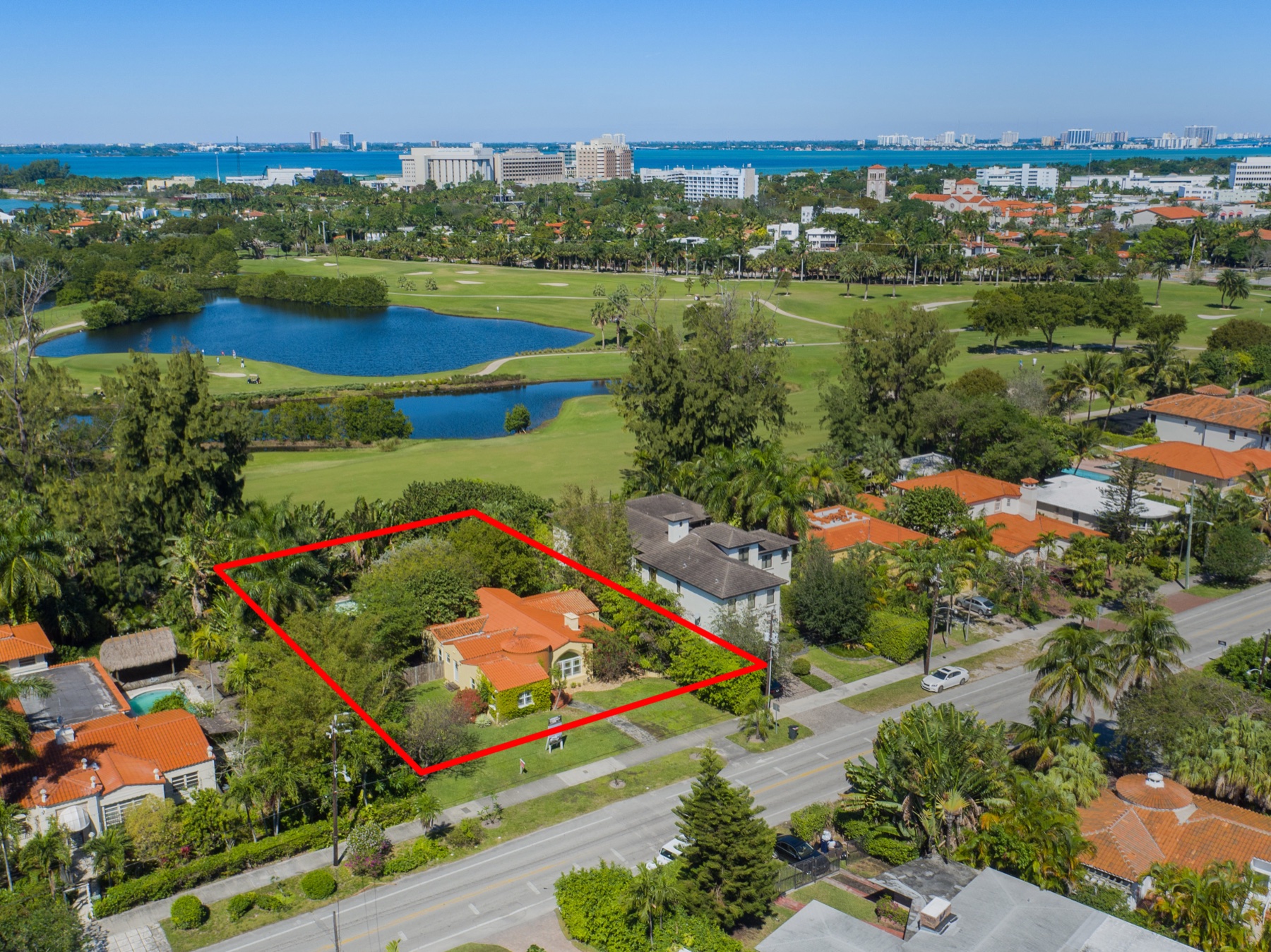 2924 Prairie Avenue — the old yellow house on a 14,600 SF lot directly on the Miami Beach Golf Club.