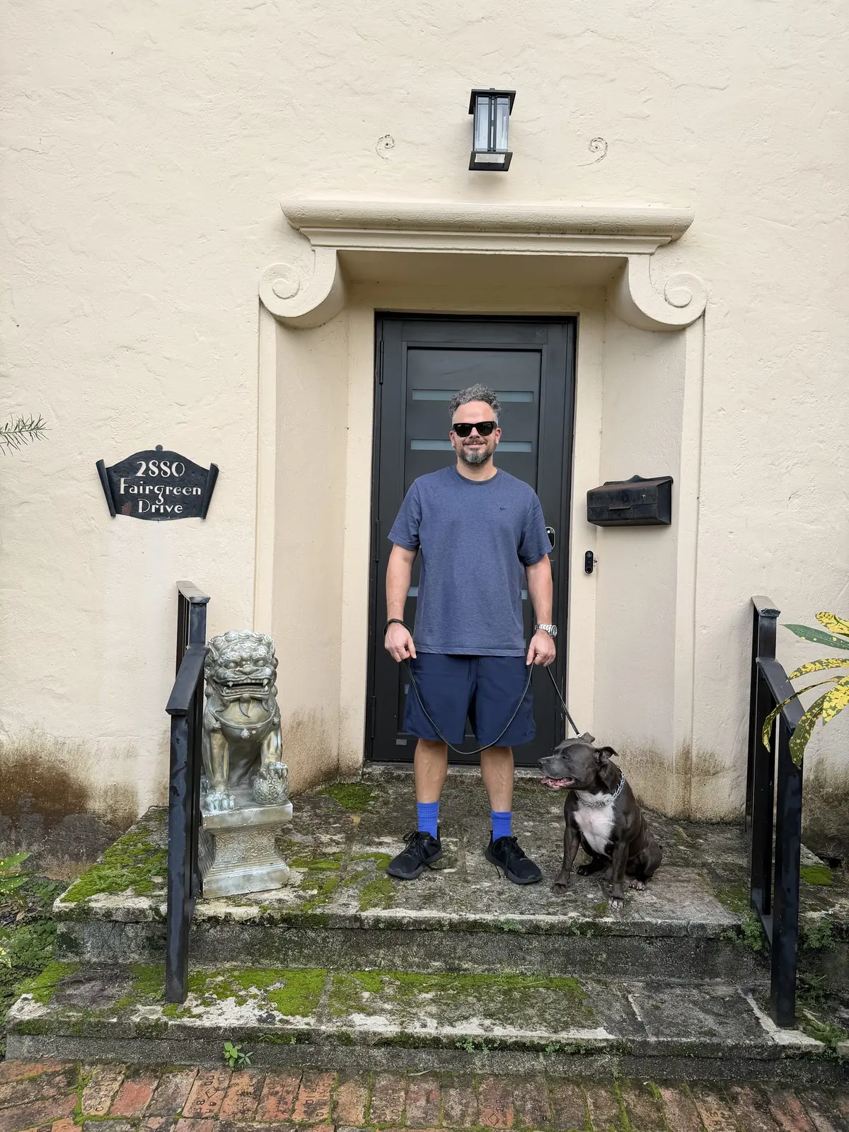 Standing at the front door of 2880 Fairgreen Drive one last time before demolition.