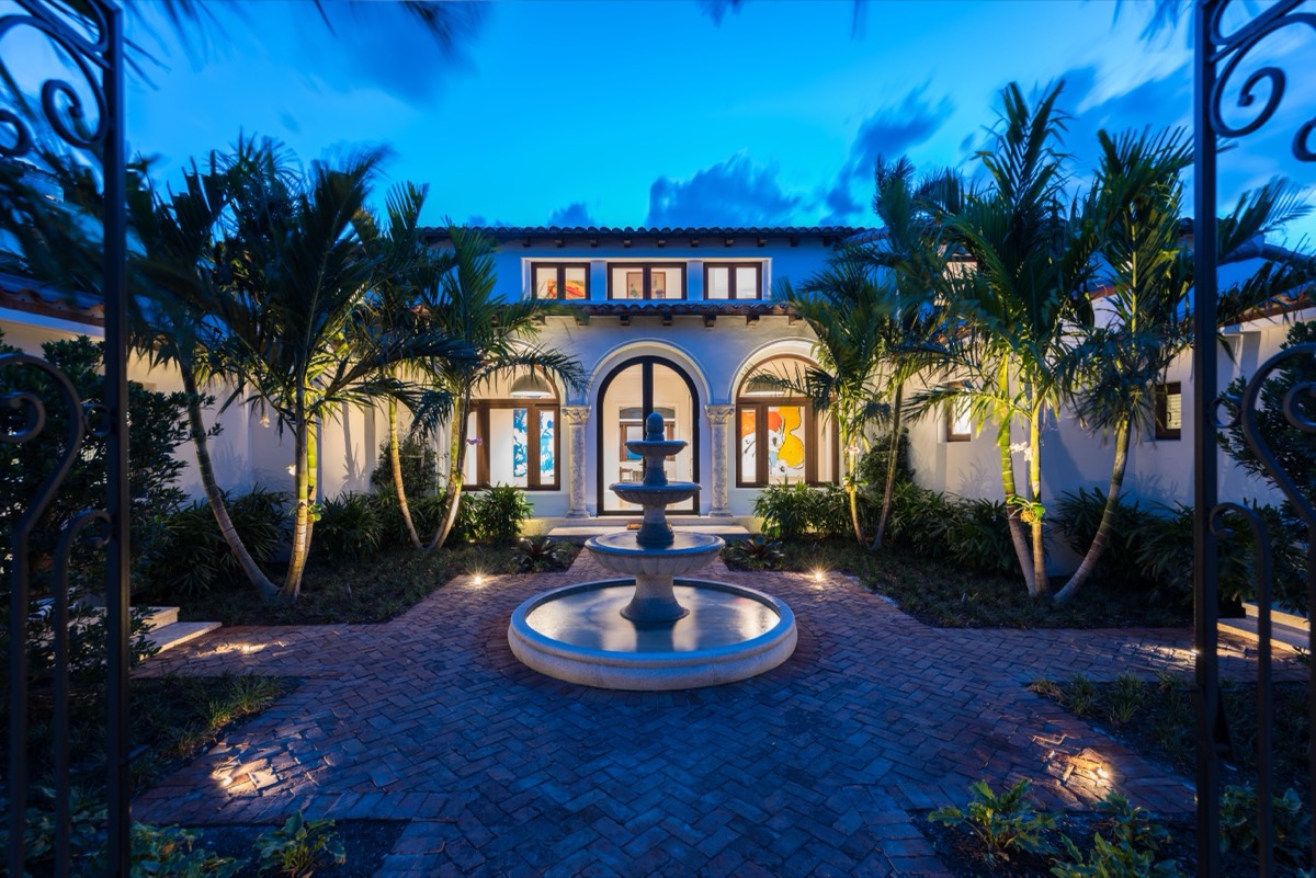 5410 North Bay Road — Mediterranean courtyard entrance on Upper North Bay Road.